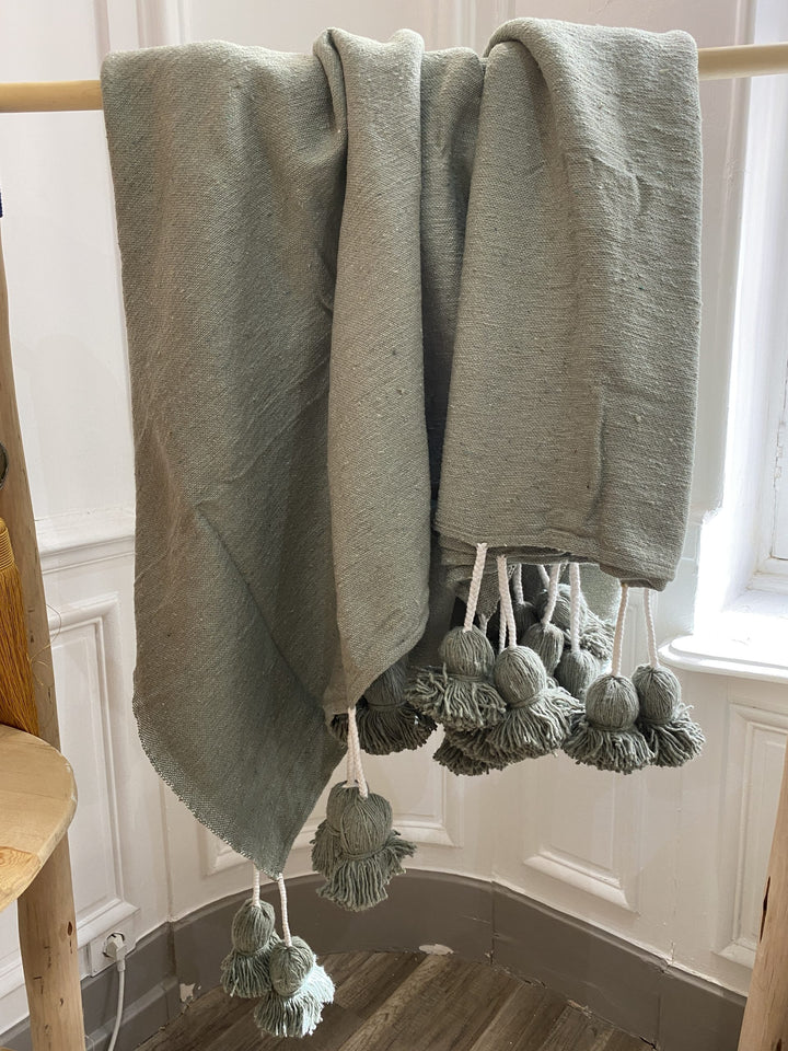 Sage green pompom throw 3/2m